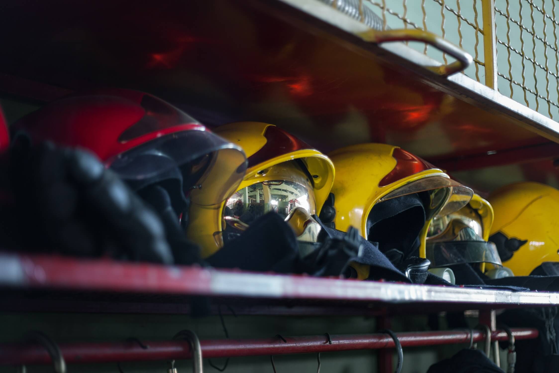 closeup shot of a row of protective yellow helmets sab2n27.jpeg