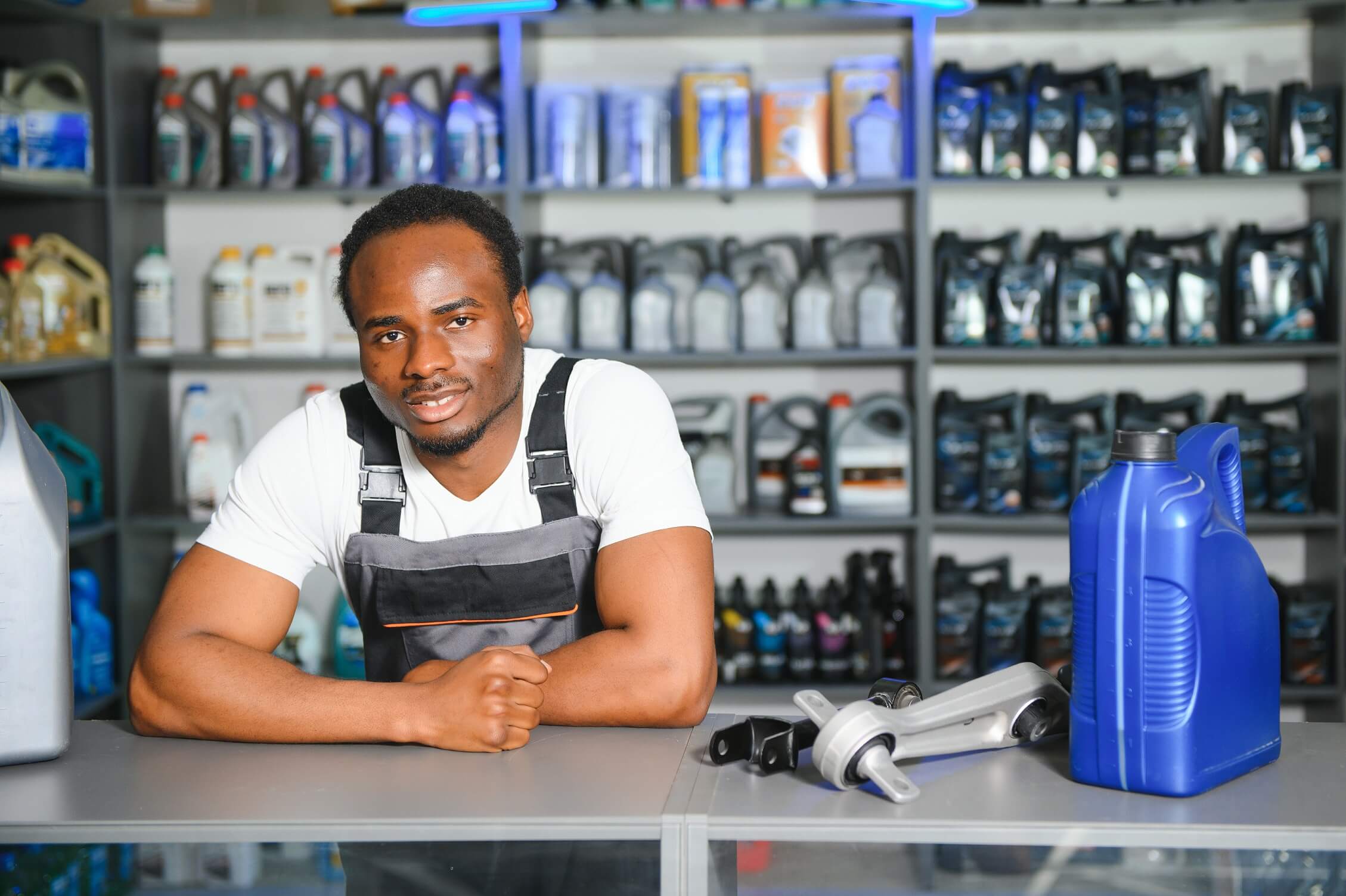 friendly worker in a warehouse and trade for car s tbvw58h.jpg